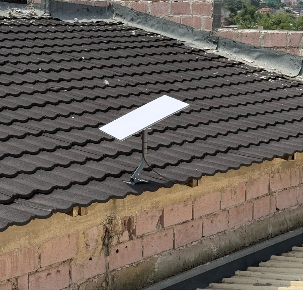Starlink Uganda standard kit installed on black roof